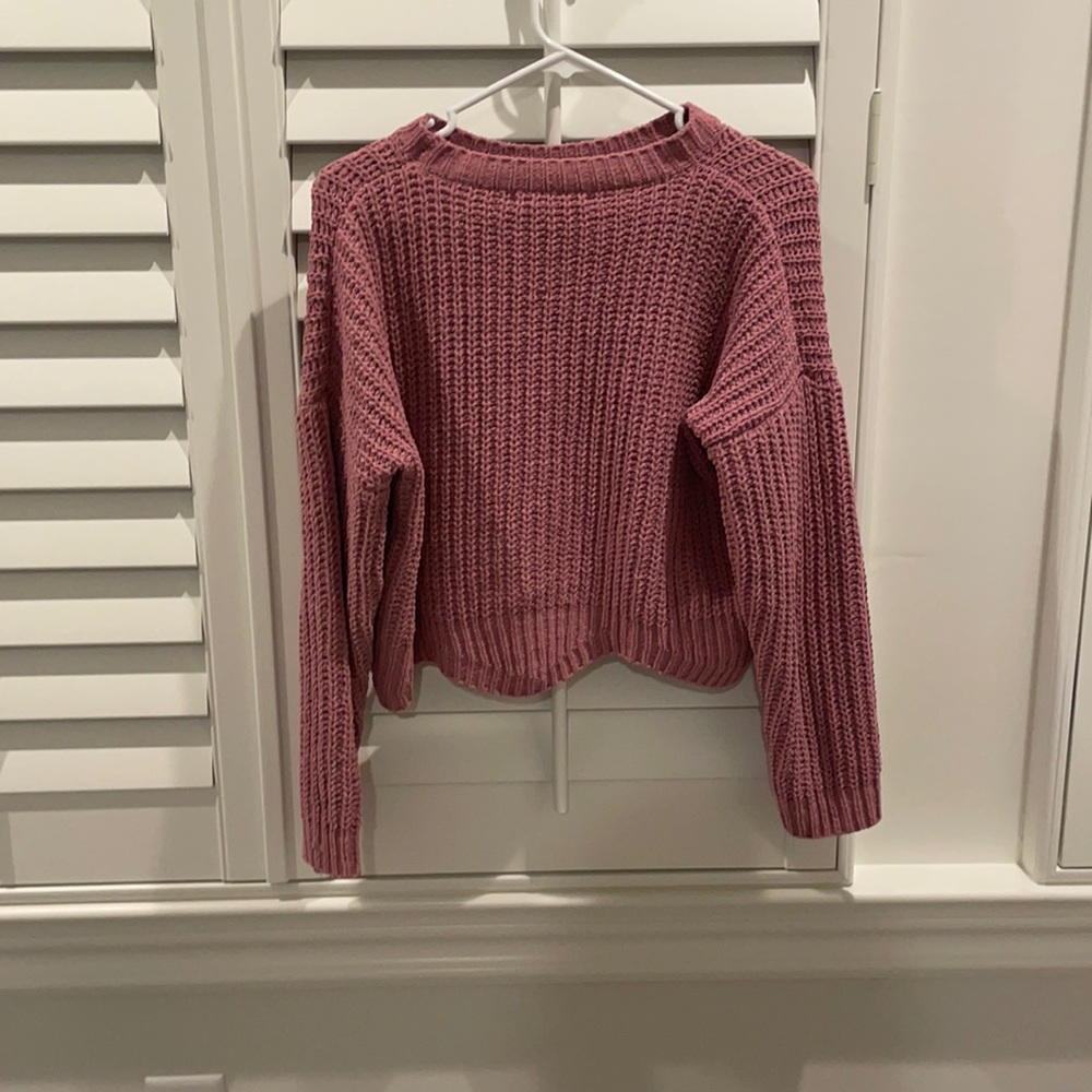 A cropped sweater